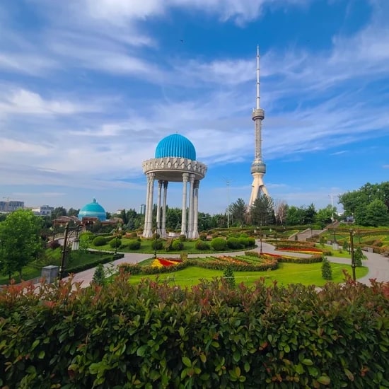 Tashkent TV Tower above a sunlit park